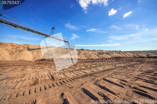 Image of Large excavator machine in the mine