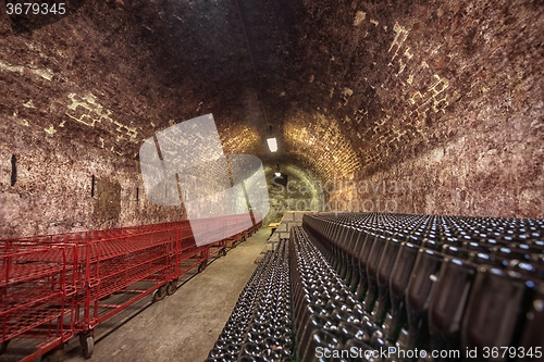 Image of Long underground brick tunnel in the wine cellar