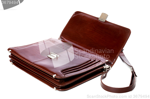 Image of Open leather briefcase on white background