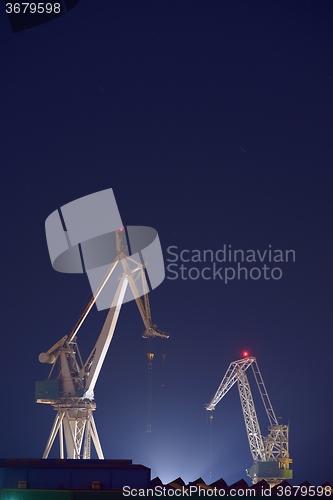 Image of Industrial cargo cranes in the dock