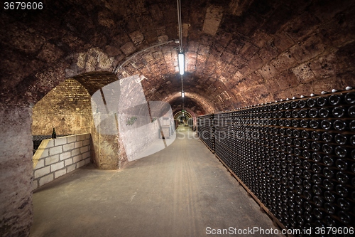 Image of Long underground brick tunnel in the wine cellar