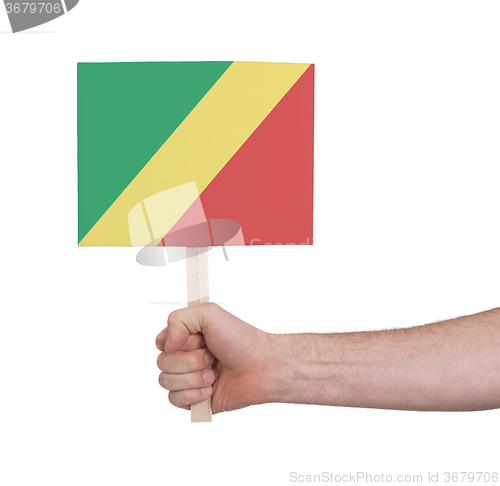 Image of Hand holding small card - Flag of Congo