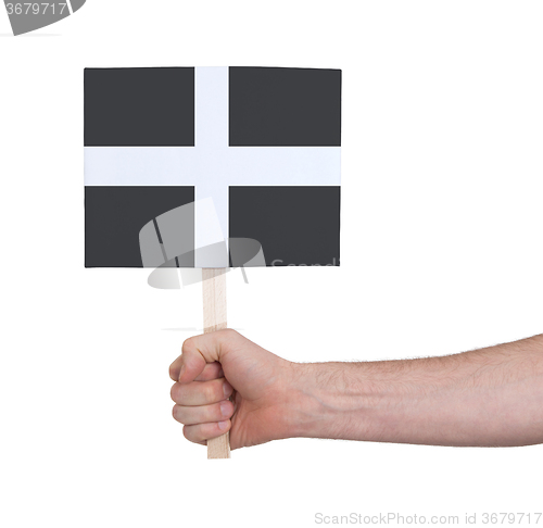 Image of Hand holding small card - Flag of Cornwall