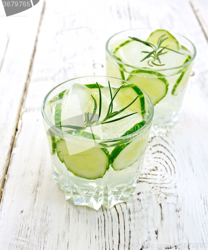 Image of Lemonade with cucumber and rosemary in two glassful on light boa