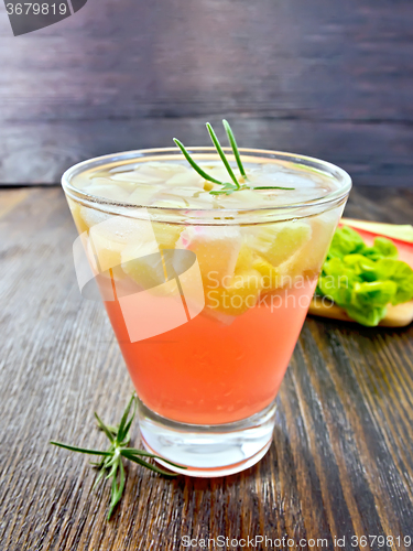Image of Lemonade with rhubarb and rosemary on dark board