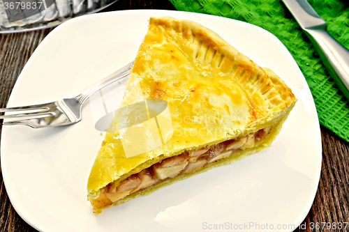 Image of Pie apple american in plate on dark board