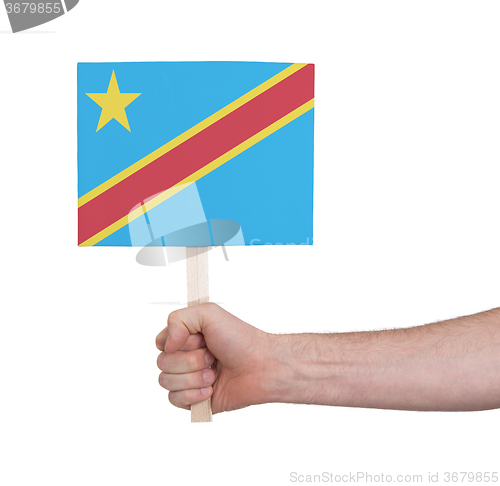 Image of Hand holding small card - Flag of Congo