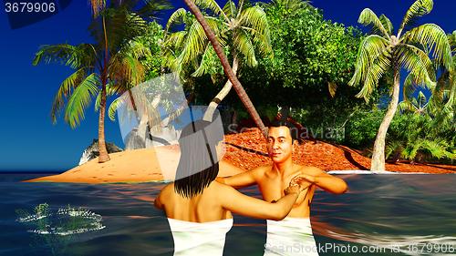 Image of Romatic couple in tropical paradise at sunset