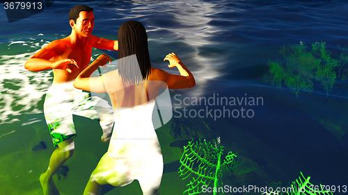 Image of Romatic couple in tropical paradise at sunset