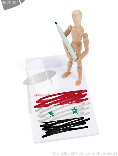 Image of Wooden mannequin made a drawing - Syria