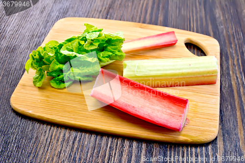 Image of Rhubarb with leaf on board