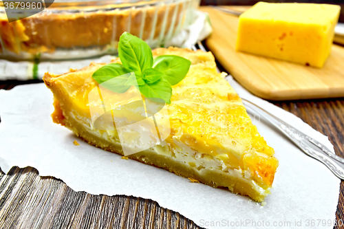 Image of Pie with cheese and leeks on parchment