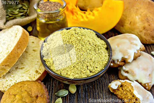 Image of Flour pumpkin in bowl with baking on board