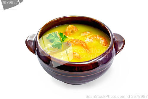 Image of Soup-puree pumpkin with shrimps in clay bowl