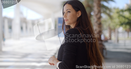 Image of Beautiful Business Woman Standing and Looking