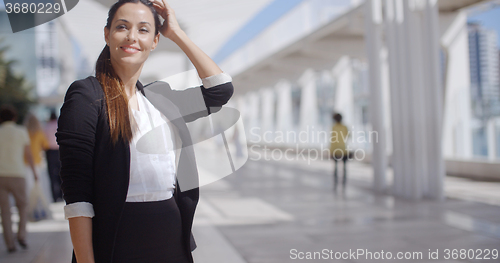 Image of Smiling happy confident young businesswoman