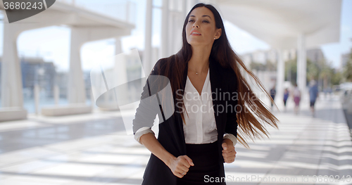 Image of Beautiful Business Woman Standing and Looking
