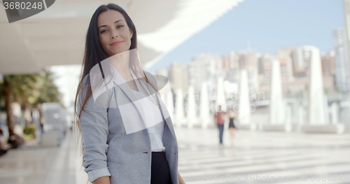 Image of Confident young woman with a friendly smile