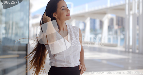 Image of Gorgeous Business Woman Standing on Urban Street