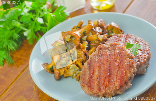 Image of burgers with fried mushrooms