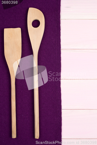 Image of Kitchenware on purple towel