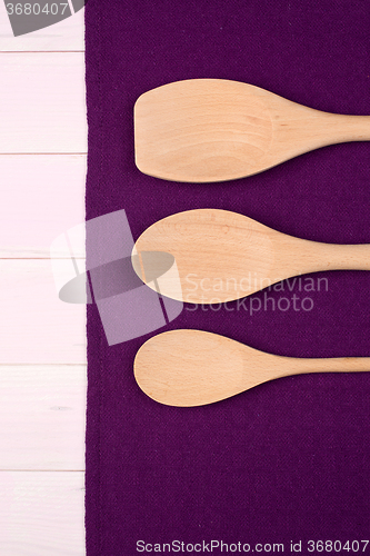 Image of Kitchenware on purple towel