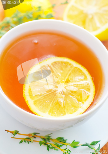 Image of Fresh tea with lemon in the white cup