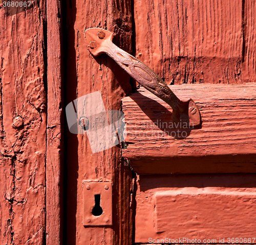 Image of spain knocker lanzarote door wood in the red brown 
