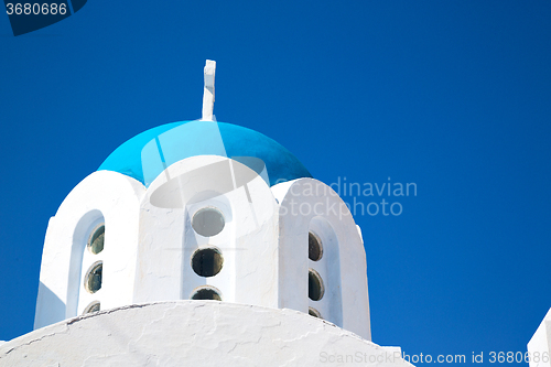 Image of white cross  in santorini greece  