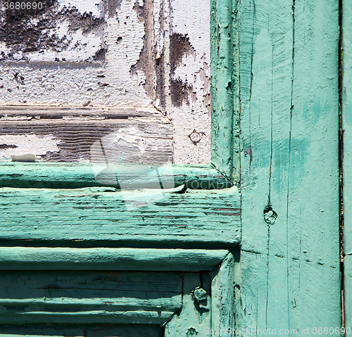 Image of spain canarias brass brown knocker in a green 