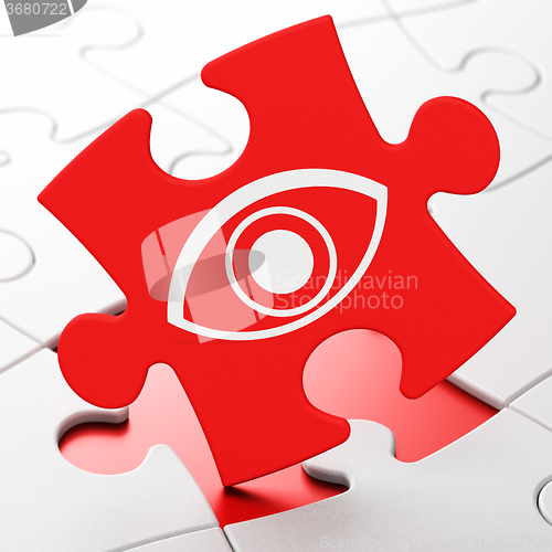 Image of Privacy concept: Eye on puzzle background