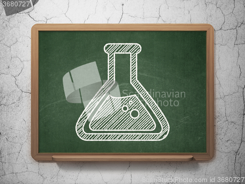 Image of Science concept: Flask on chalkboard background