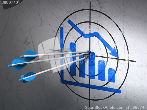 Image of Marketing concept: arrows in Decline Graph target on wall background