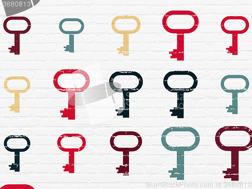 Image of Protection concept: Key icons on wall background
