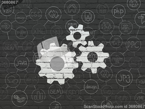 Image of Web development concept: Gears on wall background