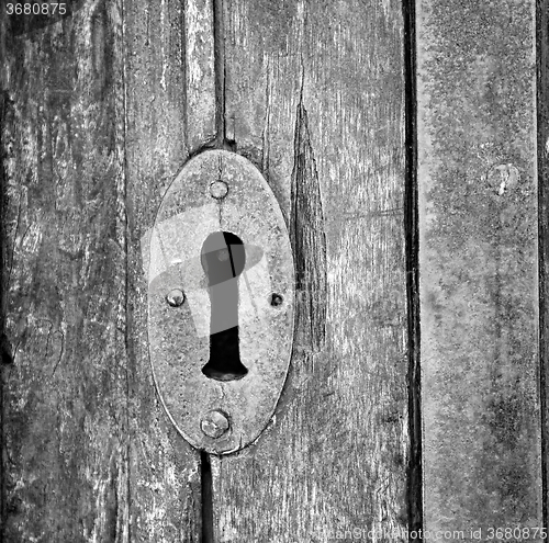 Image of  traditional   door    in italy   ancian wood and traditional  t