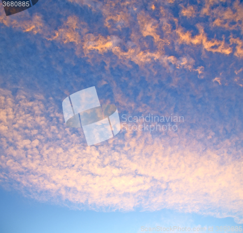 Image of sunrise in the colored sky white soft clouds and abstract backgr