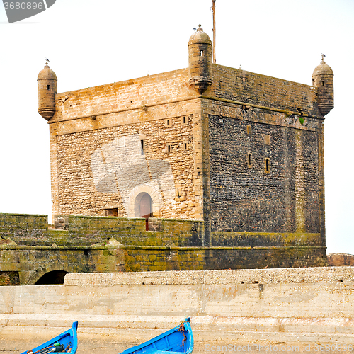 Image of   boat and sea in africa morocco old castle brown brick  sky