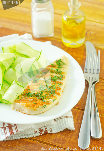 Image of chicken fillet with cucumber salad