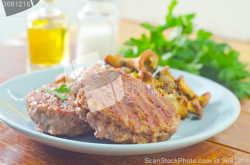 Image of burgers with fried mushrooms