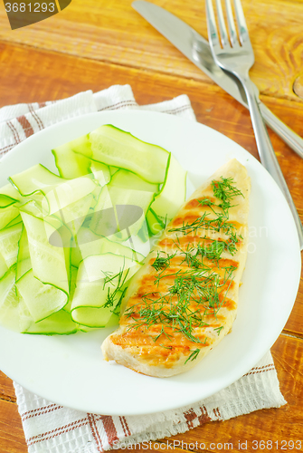 Image of chicken fillet with cucumber salad