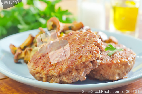 Image of burgers with fried mushrooms