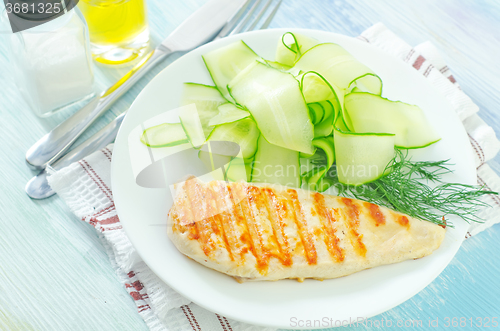 Image of chicken fillet with cucumber salad