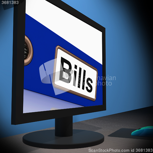 Image of Bills On Monitor Showing Paying Expenses