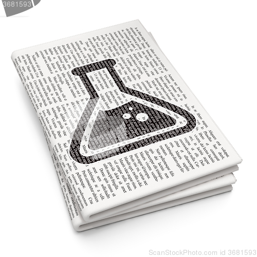 Image of Science concept: Flask on Newspaper background