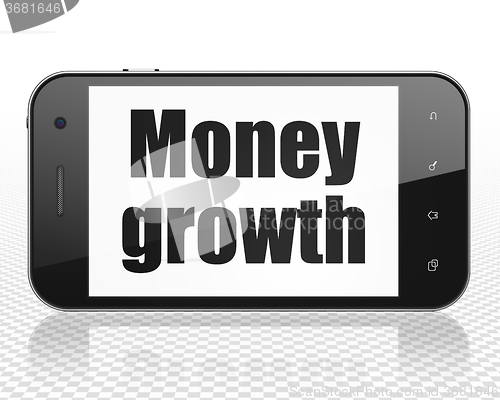 Image of Banking concept: Smartphone with Money Growth on display