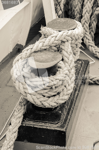 Image of Rope tied to bollard sailboat