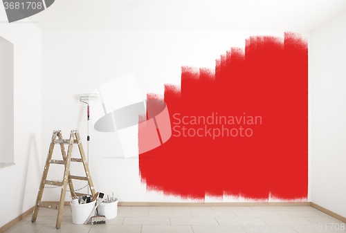 Image of painting accessories red wall