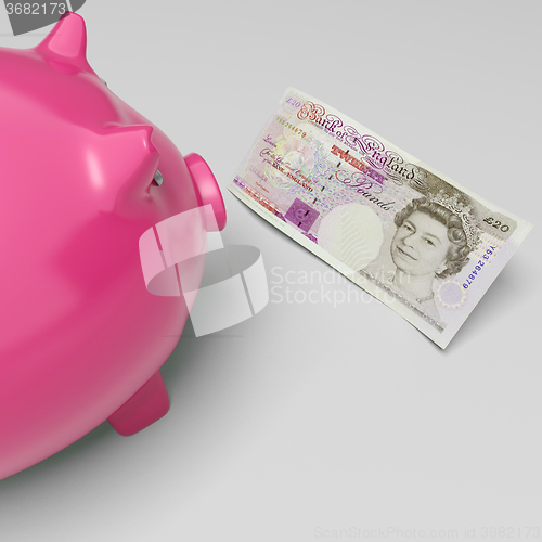 Image of Twenty Pound Note Piggy Shows UK Money