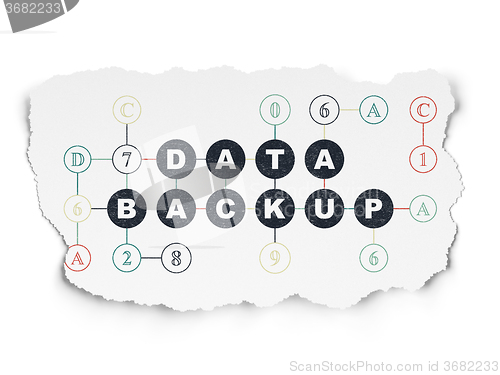 Image of Information concept: Data Backup on Torn Paper background